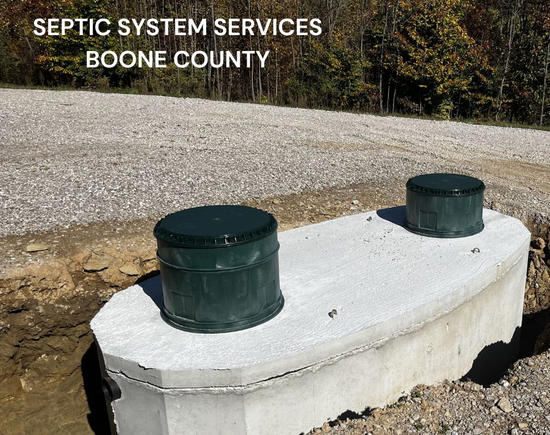 Septic System Services Boone County text overlaid on photo of concrete septic tank risers with green plastic lids at a gravel construction site